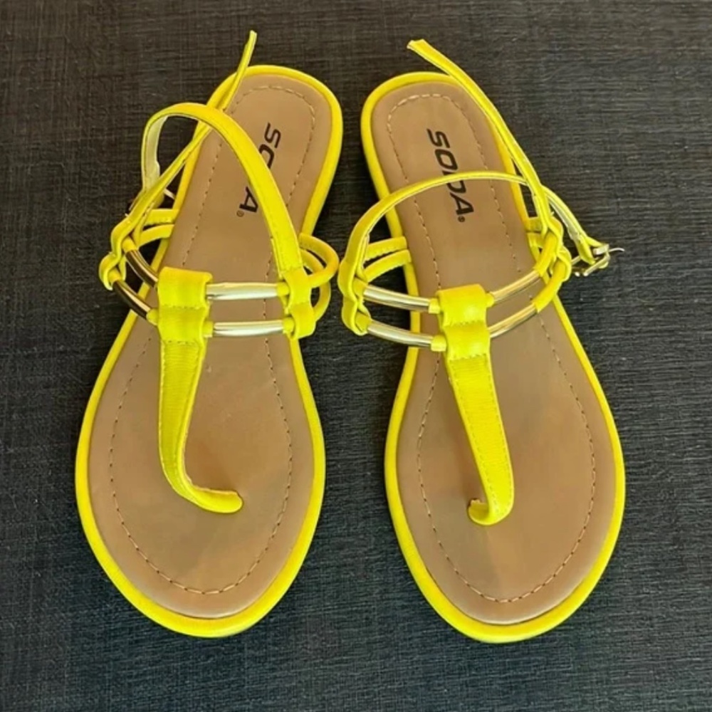 Like new!!  Yellow flat sandals size 6.5 with gold details